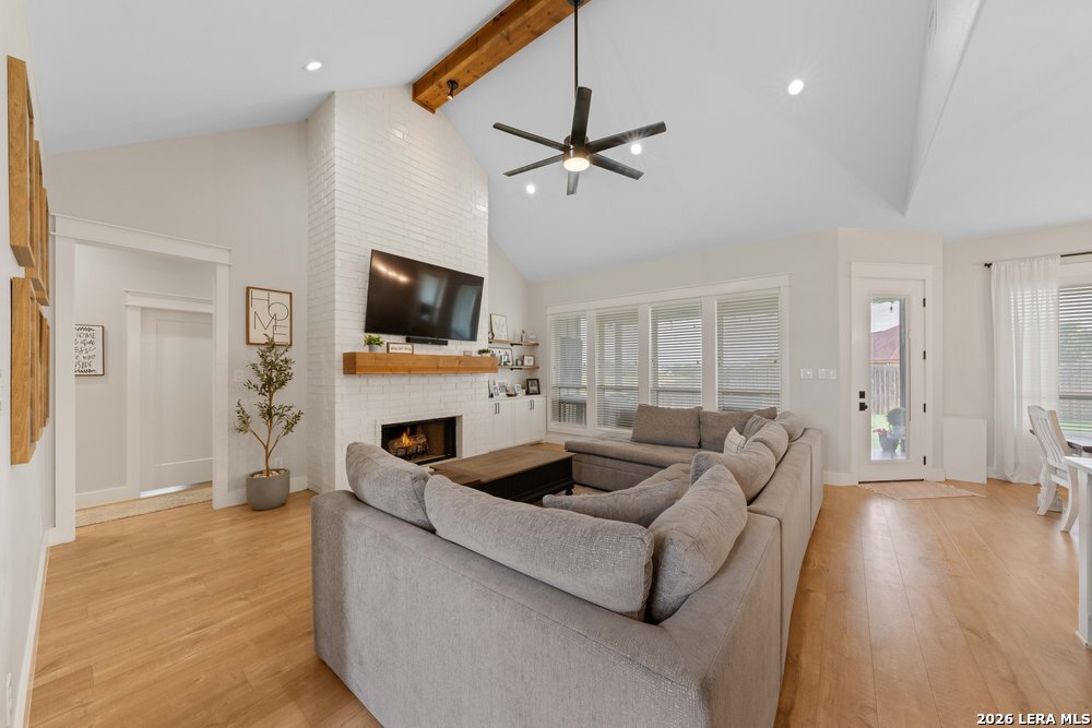 116 Park Heights Poth, TX 78147 - Photo 21 of 48 a living room with furniture and a flat screen tv