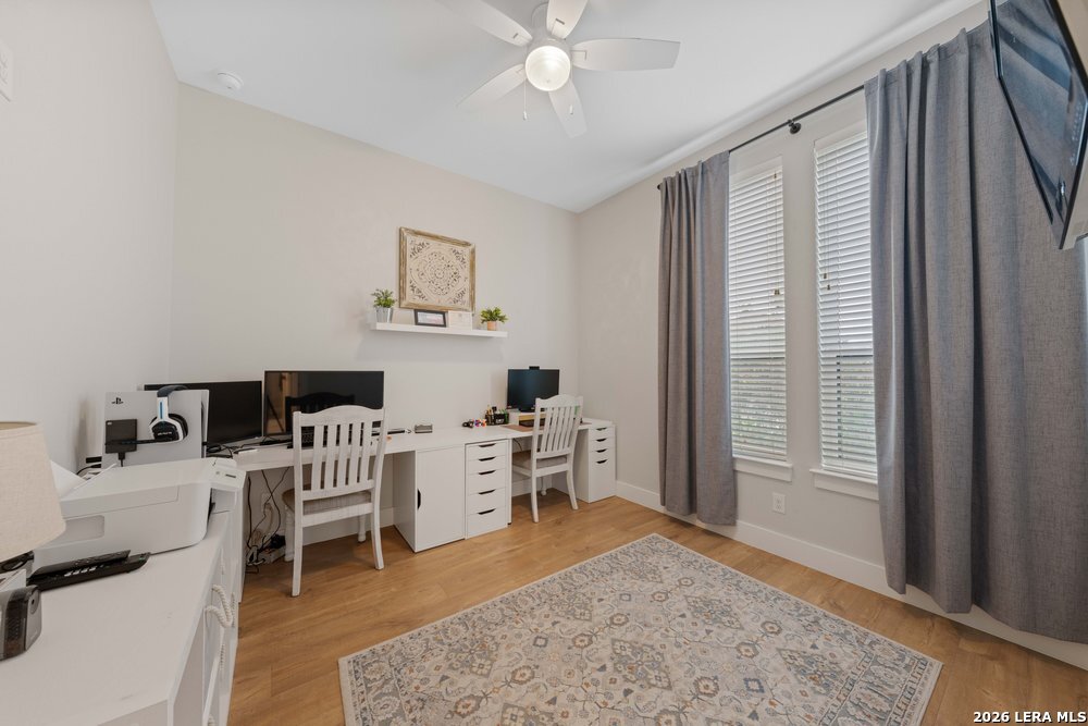 116 Park Heights Poth, TX 78147 - Photo 36 of 48 a bedroom with furniture and a window