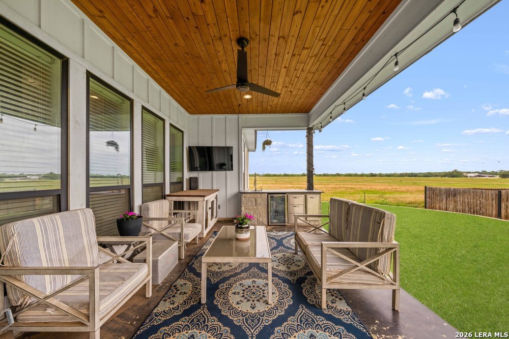 116 Park Heights Poth, TX 78147 - Photo 40 of 48 a view of a patio with dining table and chairs