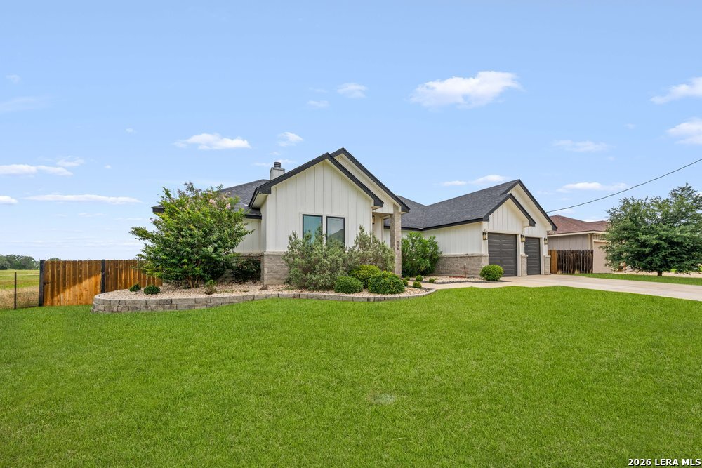 116 Park Heights Poth, TX 78147 - Photo 4 of 48 a front view of house with yard and green space