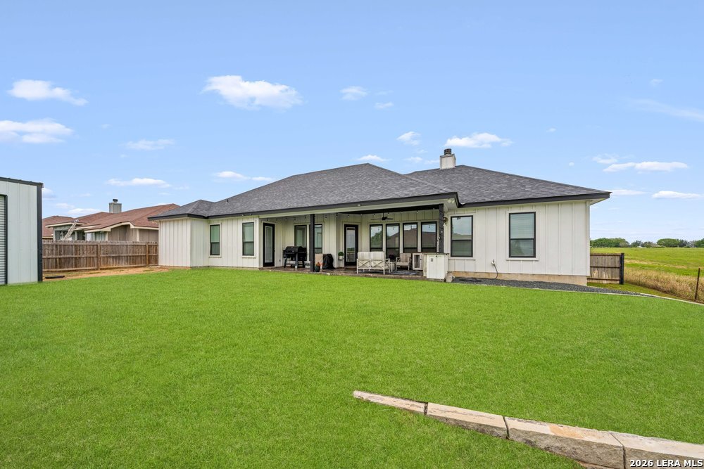 116 Park Heights Poth, TX 78147 - Photo 45 of 48 a front view of a house with a garden