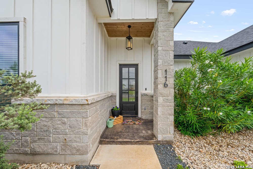 116 Park Heights Poth, TX 78147 - Photo 5 of 48 a front view of a house with garden