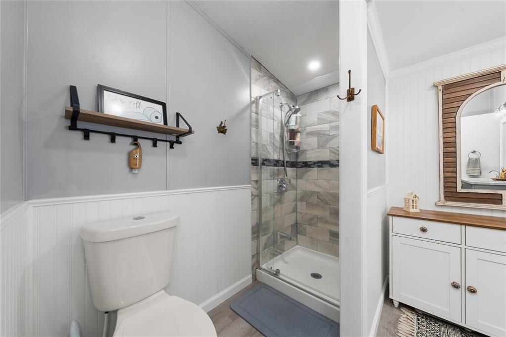 708 Fazzini Road Babson Park, FL 33827 - Photo 15 of 47 a bathroom with a shower a toilet and a sink