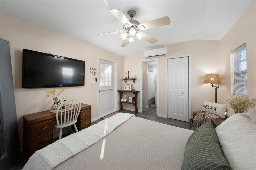 708 Fazzini Road Babson Park, FL 33827 - Photo 18 of 47 a bedroom with a bed and a flat screen tv