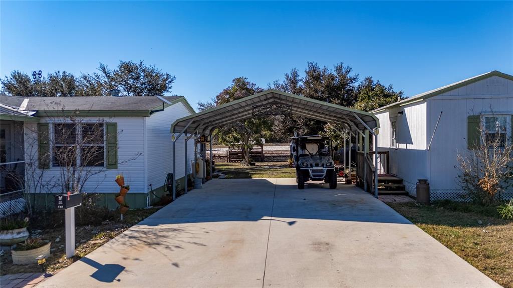 708 Fazzini Road Babson Park, FL 33827 - Photo 5 of 47 a view of a house with many windows