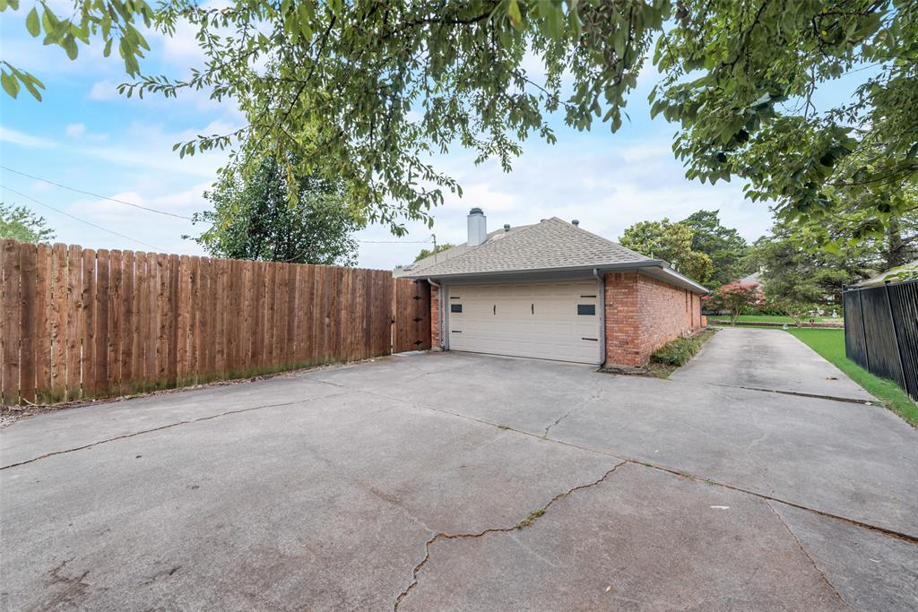 208 Timber Ridge Drive Murphy, TX 75094 - Photo 22 of 22 a view of backyard and trees