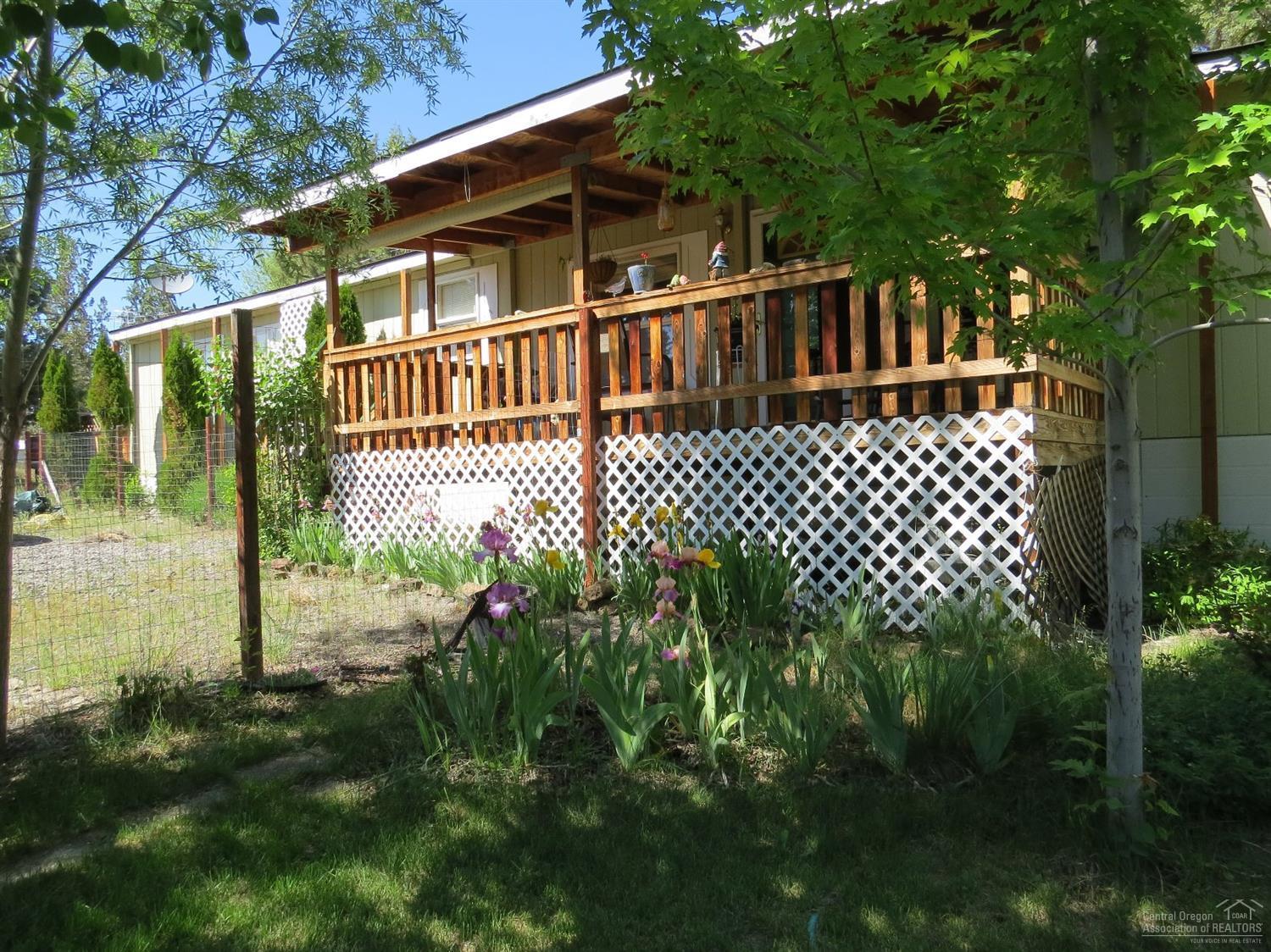 8280 Southwest Crater Loop Road Terrebonne, OR 97760 - Photo 20 of 25 A springtime shot of this lovely home wi