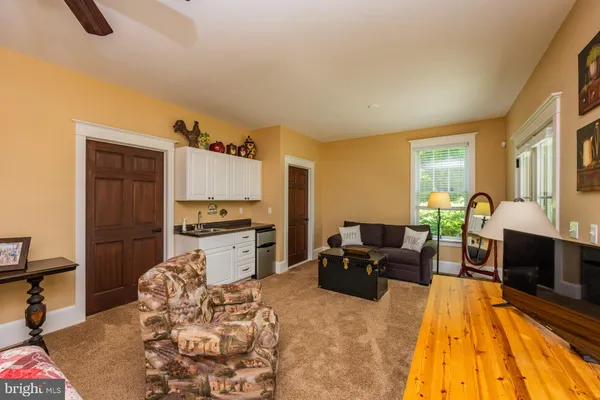 a bedroom with a bed and furniture