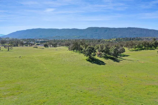 a view of an ocean and a mountain
