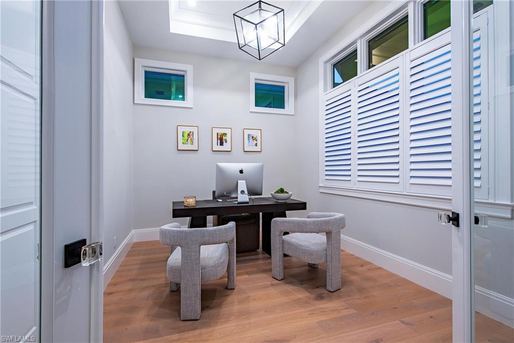 6830 Mangrove Avenue Naples, FL 34109 - Photo 15 of 28 a view of a workspace with furniture