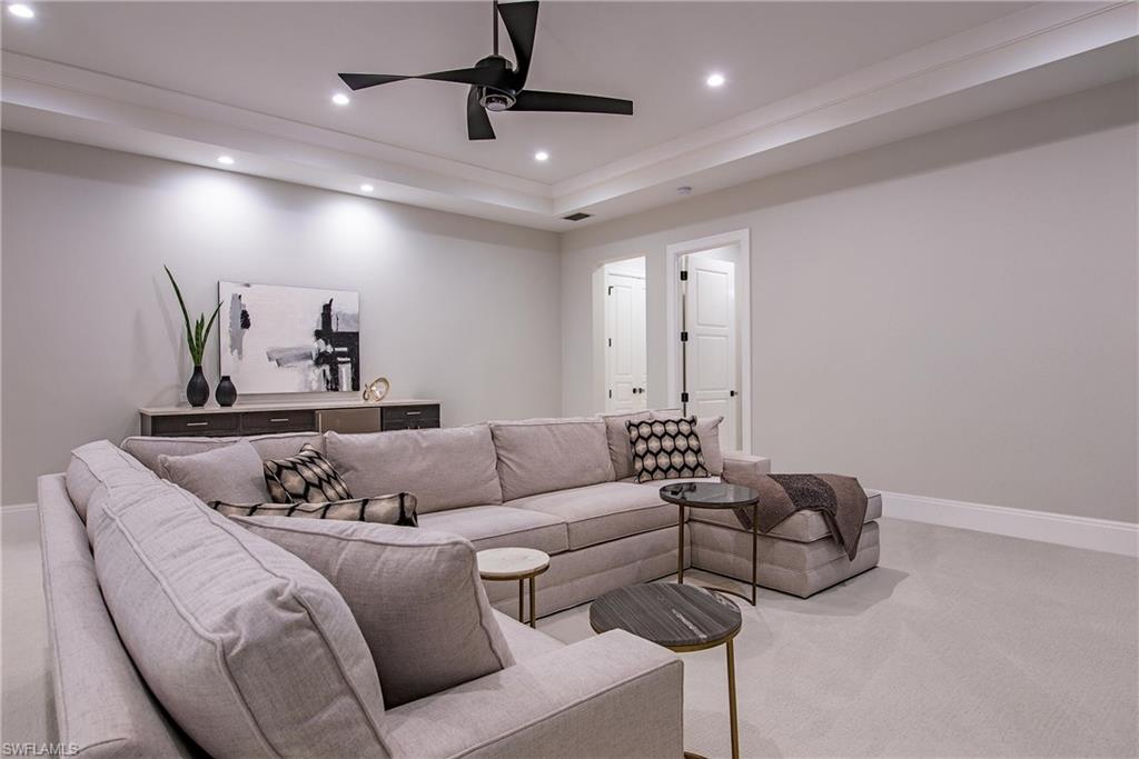 6830 Mangrove Avenue Naples, FL 34109 - Photo 20 of 28 a living room with furniture