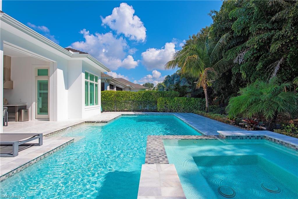 6830 Mangrove Avenue Naples, FL 34109 - Photo 28 of 28 a view of yard with swimming pool
