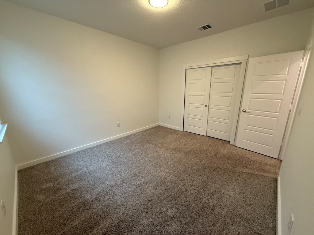 220 Century Plant Road Leander, TX 78641 - Photo 12 of 16 an empty room with closet area