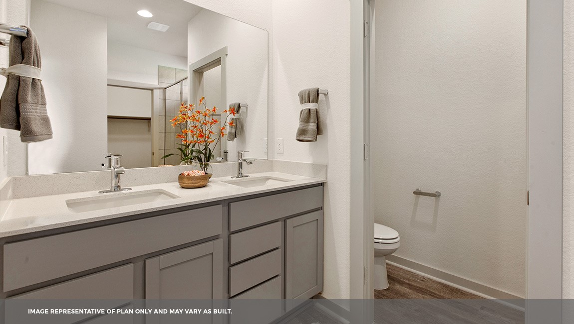 220 Century Plant Road Leander, TX 78641 - Photo 14 of 16 a bathroom with a sink and a mirror