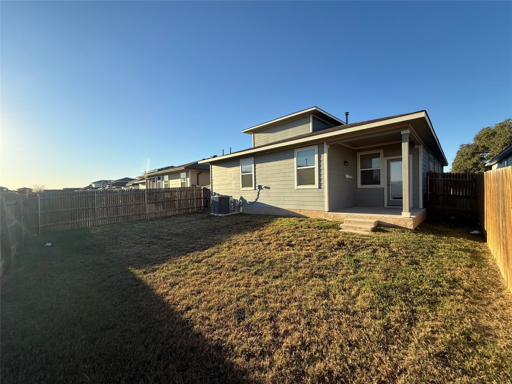 220 Century Plant Road Leander, TX 78641 - Photo 15 of 16 a view of a house with a backyard