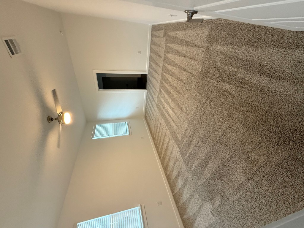 220 Century Plant Road Leander, TX 78641 - Photo 10 of 16 a view of an empty room and a window