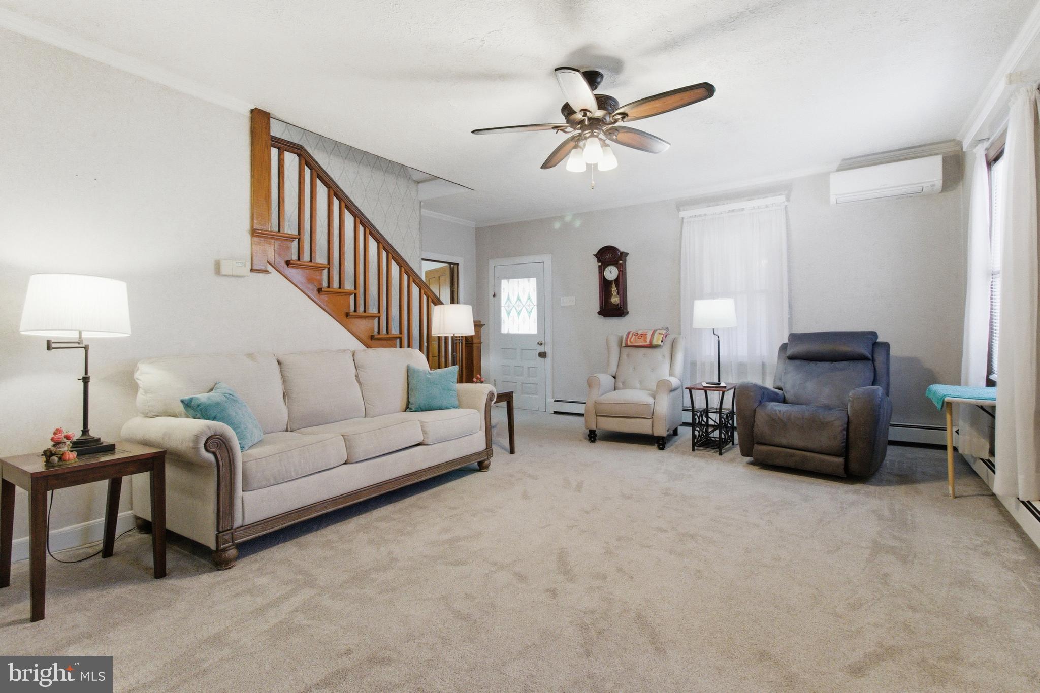 82 Ridge Street Smokerun, PA 16681 - Photo 38 of 52 a living room with furniture and a lamp