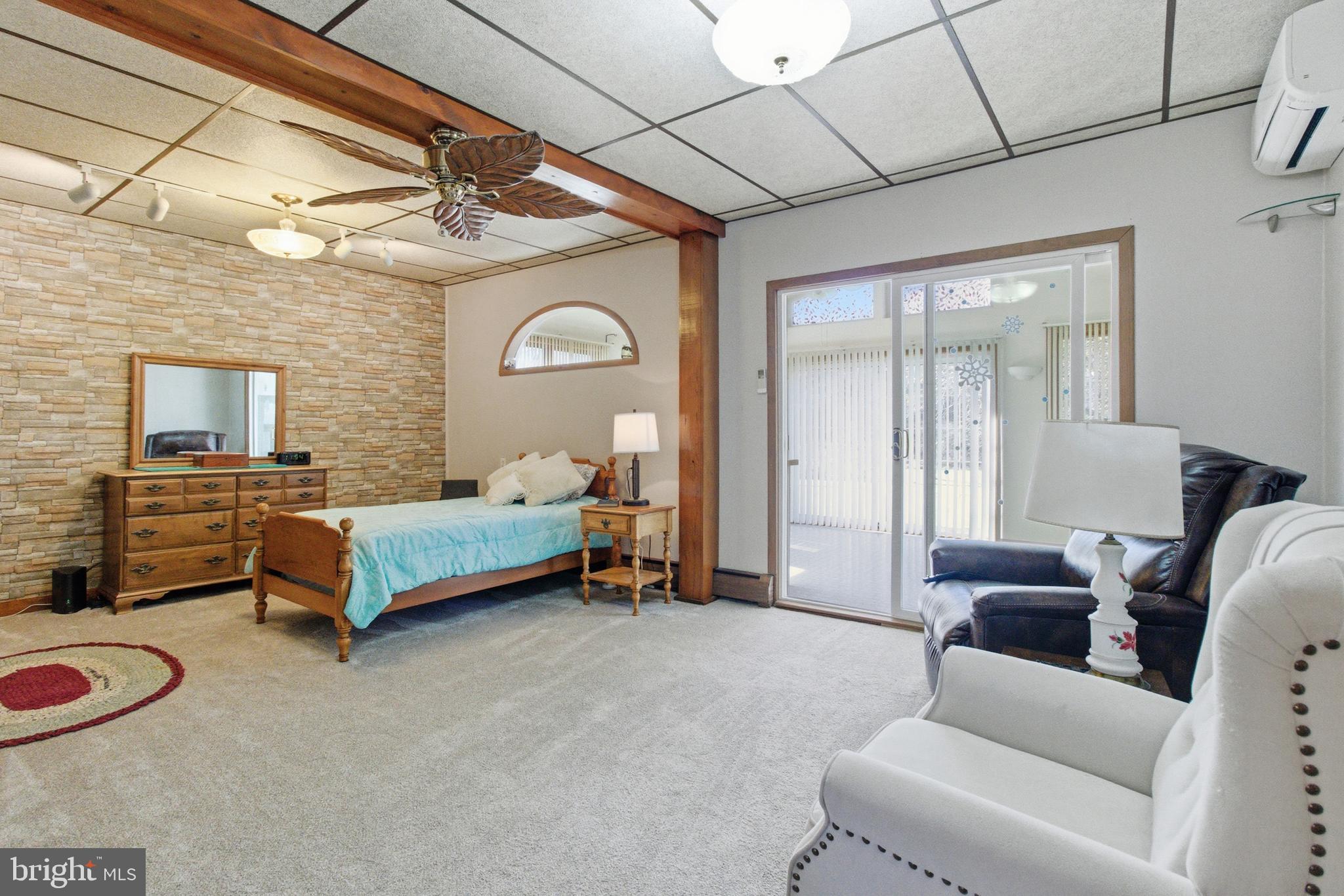 82 Ridge Street Smokerun, PA 16681 - Photo 40 of 52 a bedroom with furniture and a large window