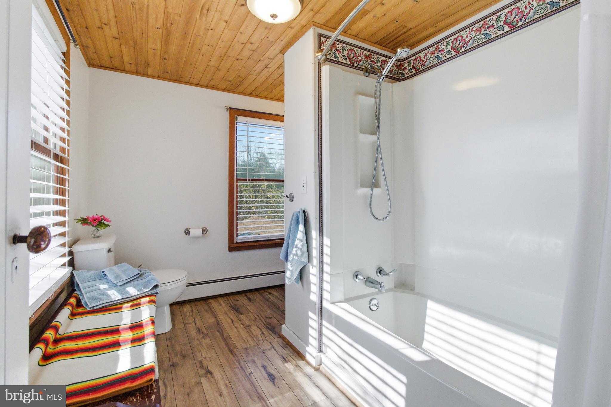 82 Ridge Street Smokerun, PA 16681 - Photo 47 of 52 a bathroom with a bathtub and shower