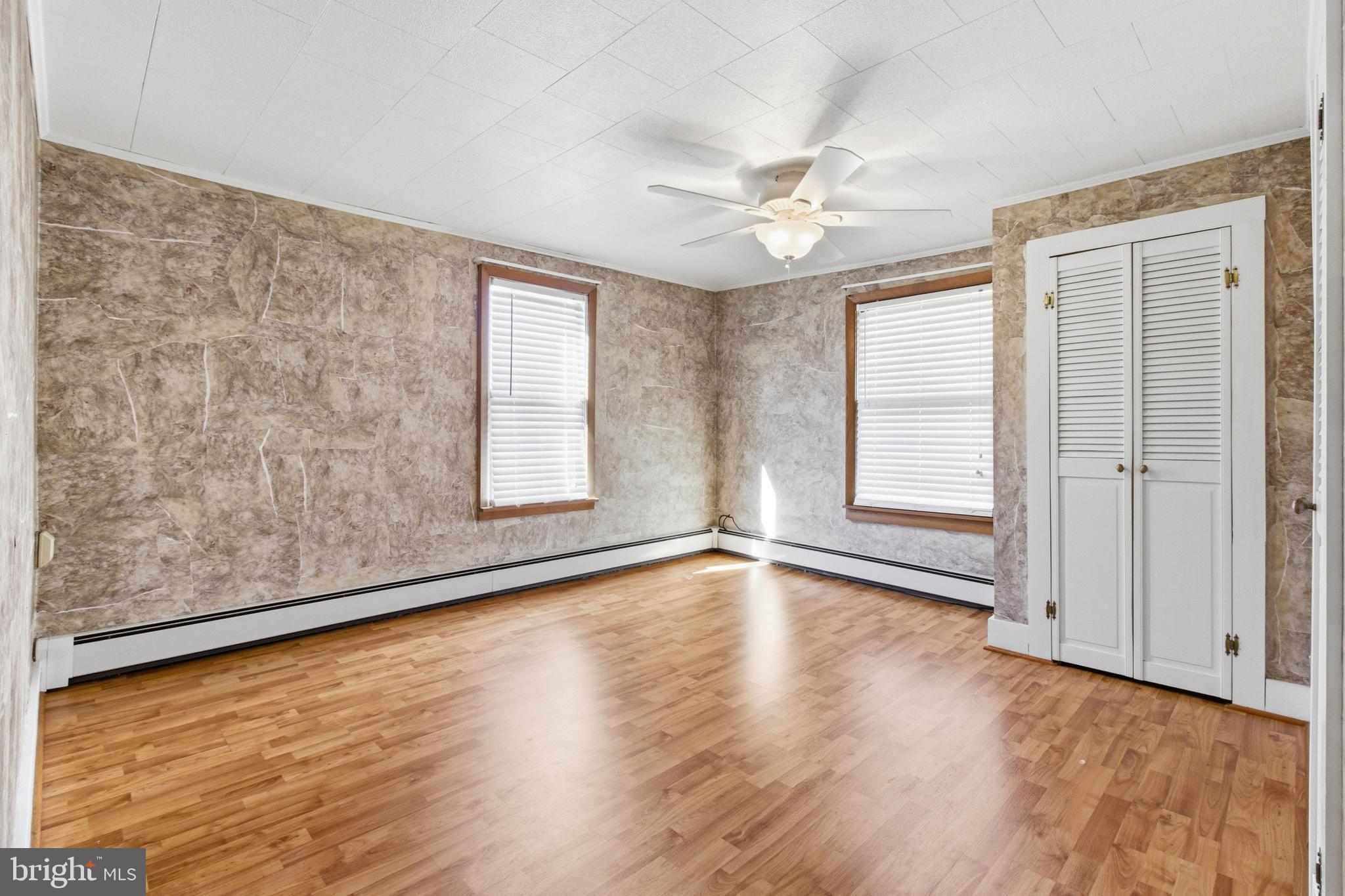 82 Ridge Street Smokerun, PA 16681 - Photo 49 of 52 wooden floor in an empty room with a window