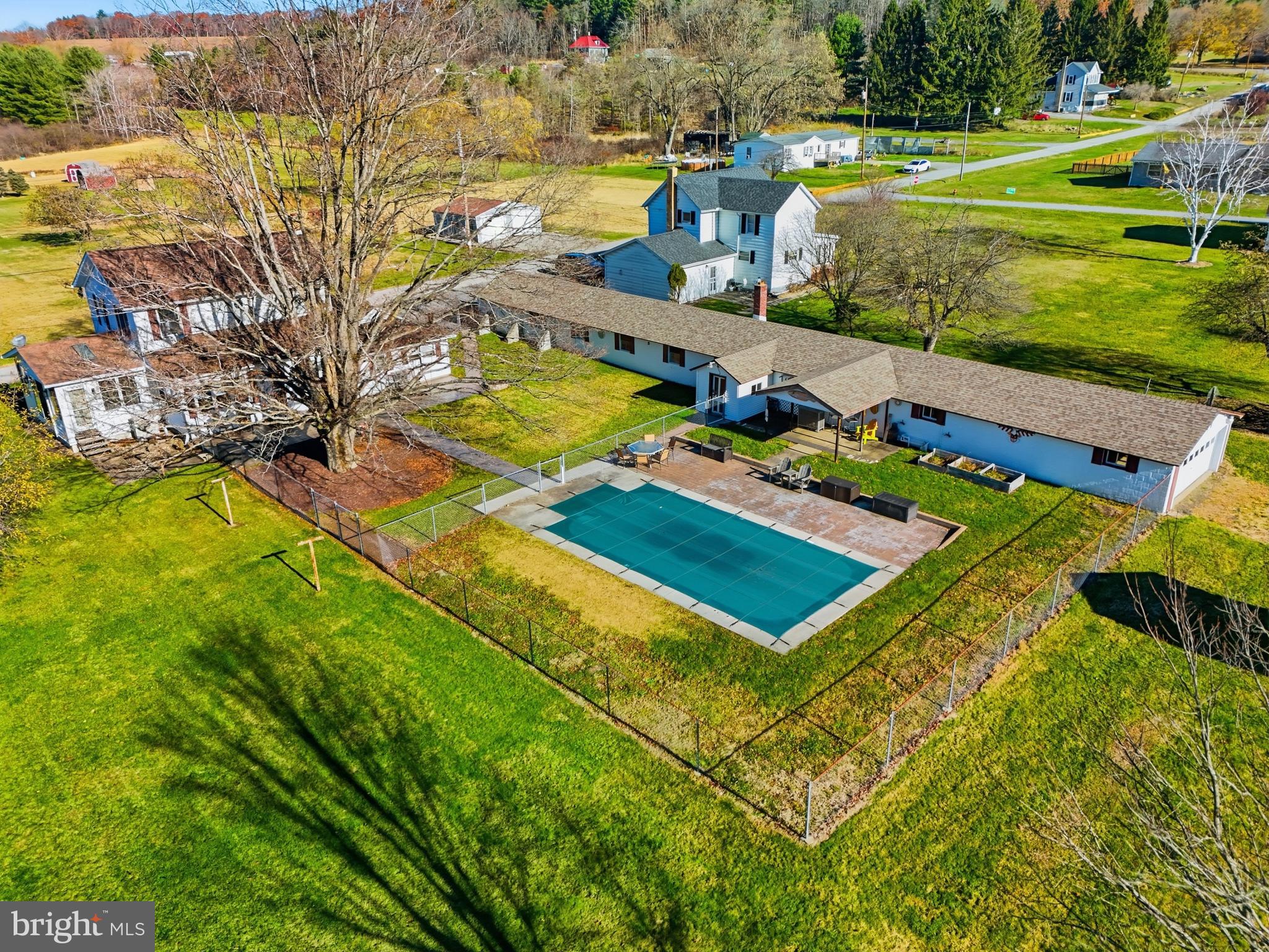 82 Ridge Street Smokerun, PA 16681 - Photo 8 of 52 an aerial view of a residential houses with yard