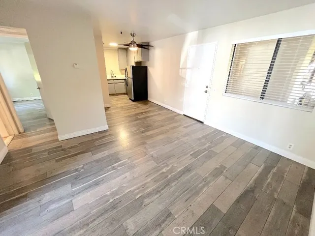 a view of a kitchen from the hallway