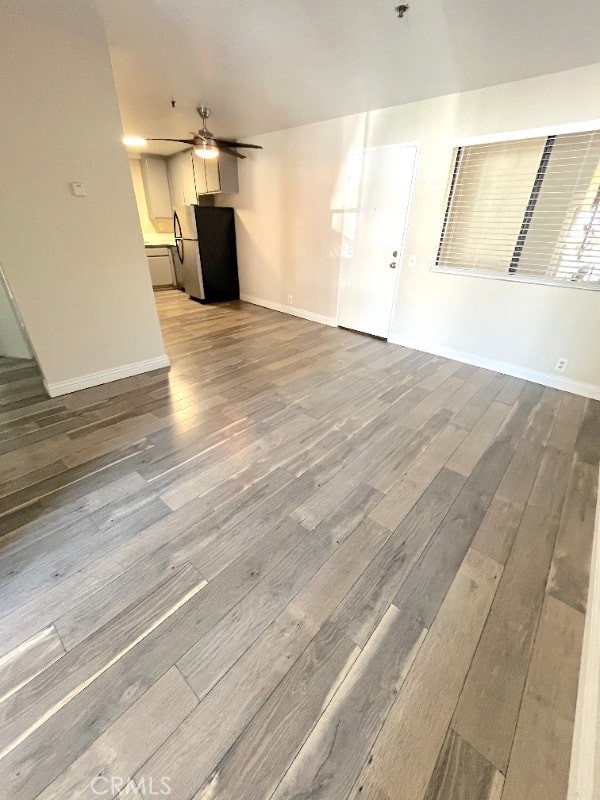 248 West Avenida Palizada, Unit 2 San Clemente, CA 92672 - Photo 4 of 21 a view of empty room with wooden floor