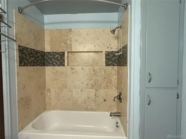 a bathroom with a bathtub