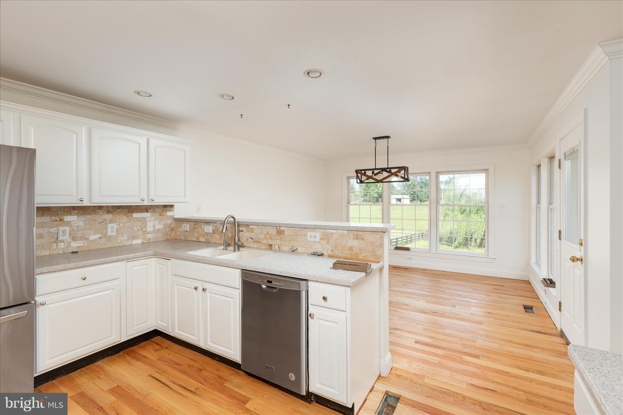 1200 Salem Church Road Stephens City, VA 22655 - Photo 12 of 69 a kitchen with a sink stove and cabinets
