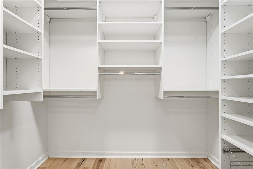 5742 Fifth Avenue, Unit 304 Pittsburgh, PA 15232 - Photo 23 of 32 a view of walk in closet with empty racks