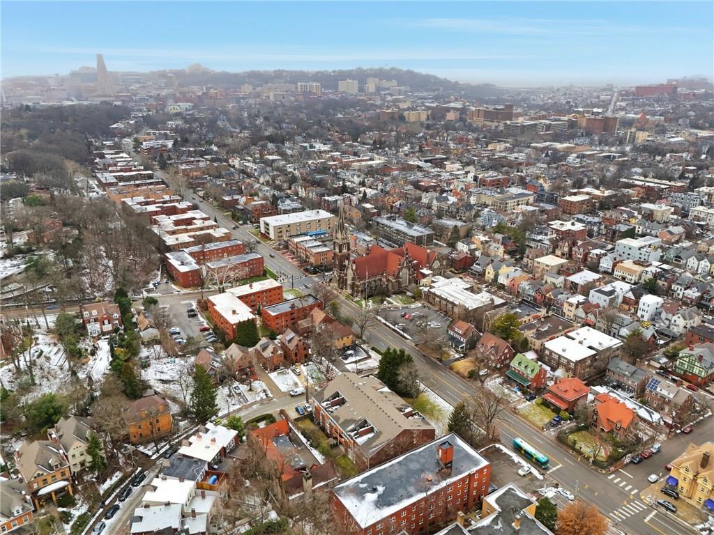 5742 Fifth Avenue, Unit 304 Pittsburgh, PA 15232 - Photo 31 of 32 an aerial view of residential building with green space
