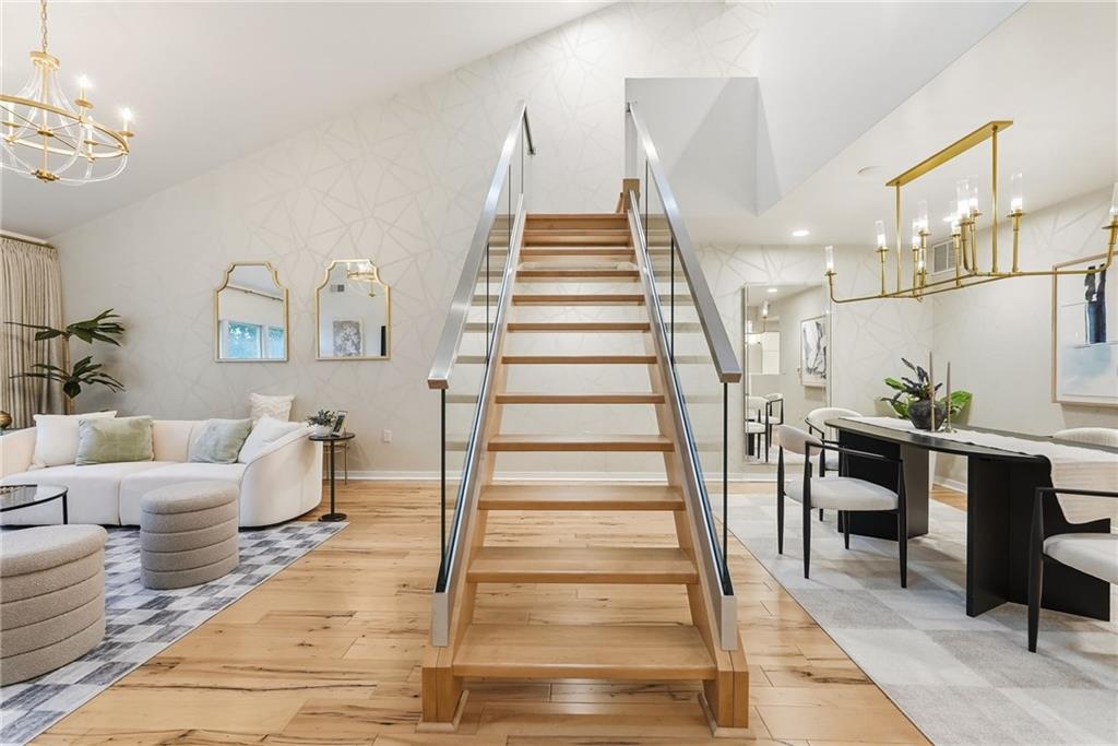 5742 Fifth Avenue, Unit 304 Pittsburgh, PA 15232 - Photo 8 of 32 a living room with furniture and a painting