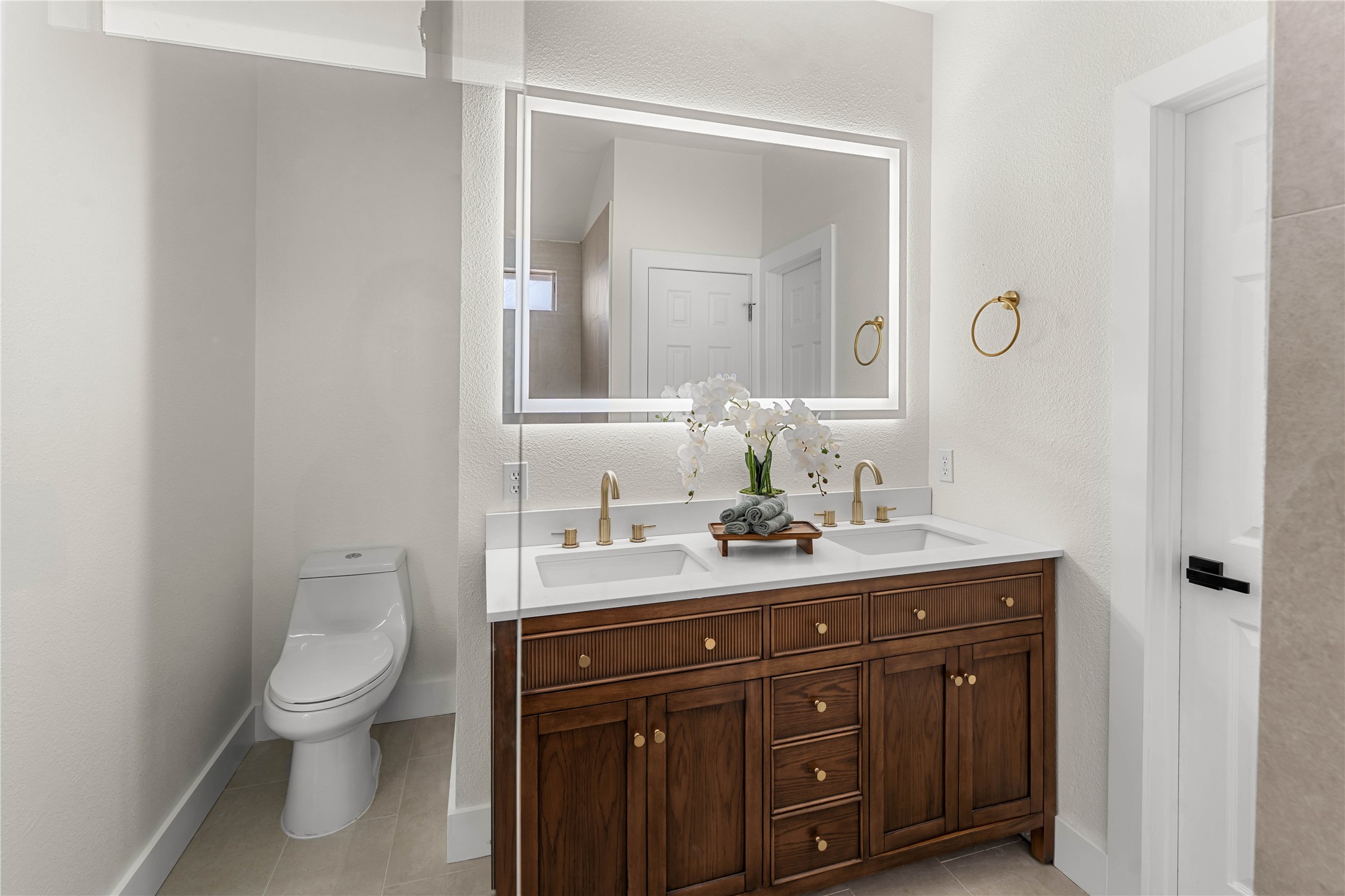 183 Musgrav Kyle, TX 78640 - Photo 14 of 24 a bathroom with a granite countertop toilet sink and mirror