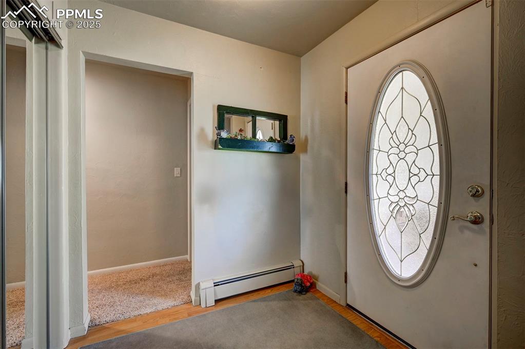 427 Ute Avenue Simla, CO 80835 - Photo 15 of 49 a view of a livingroom with the furniture window and mirror
