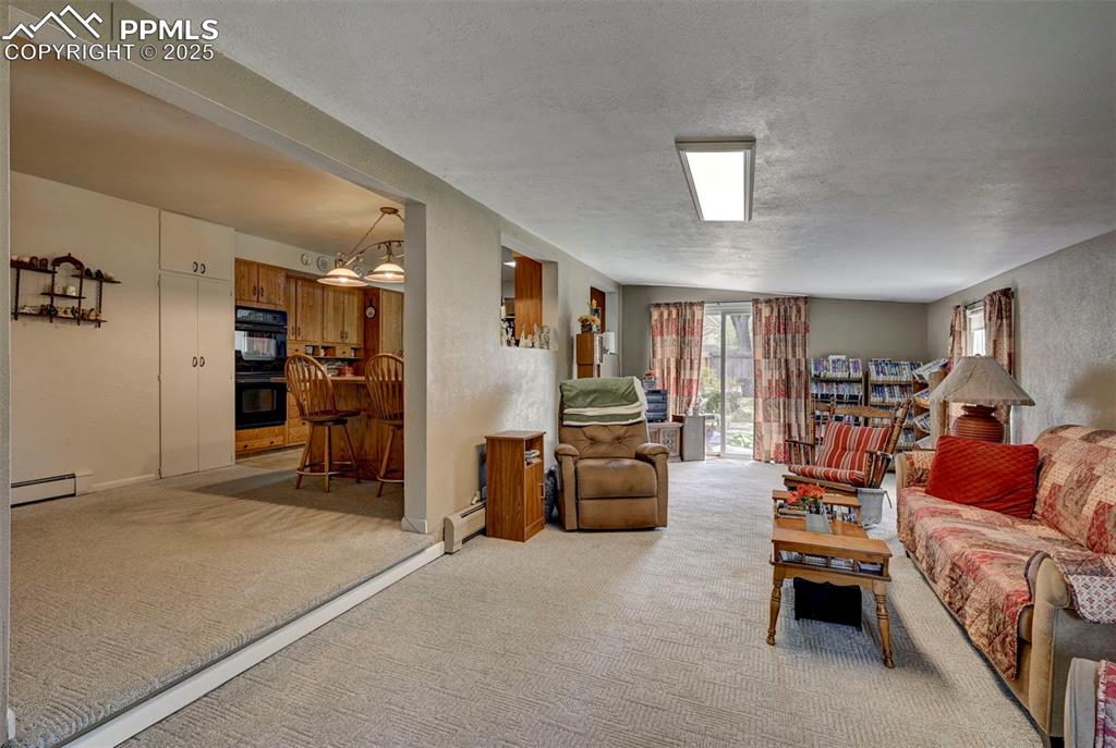 427 Ute Avenue Simla, CO 80835 - Photo 18 of 49 a view of a livingroom with furniture and window
