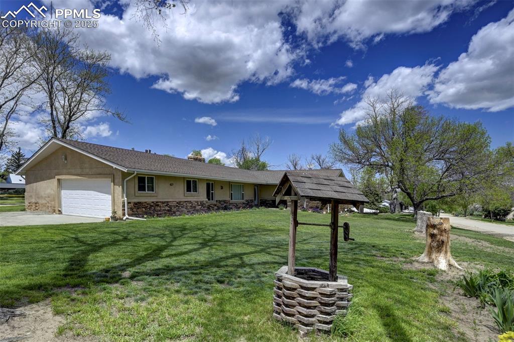 427 Ute Avenue Simla, CO 80835 - Photo 2 of 49 a front view of a house with a yard