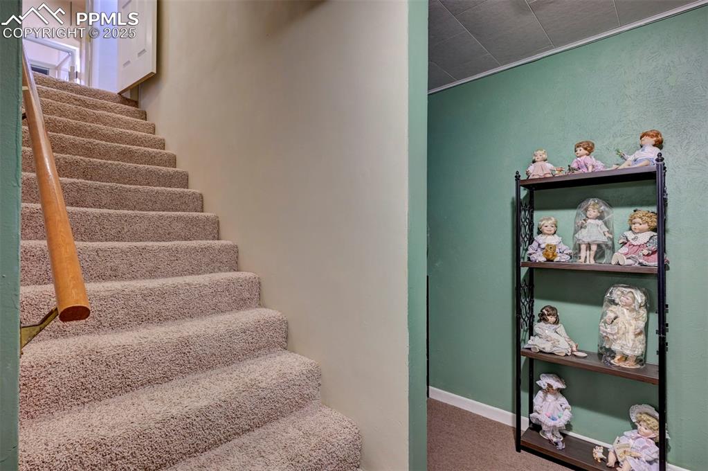 427 Ute Avenue Simla, CO 80835 - Photo 30 of 49 a view of entryway with stairs and toys