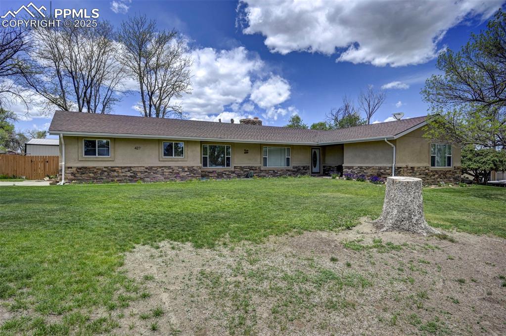 427 Ute Avenue Simla, CO 80835 - Photo 3 of 49 a front view of house with yard