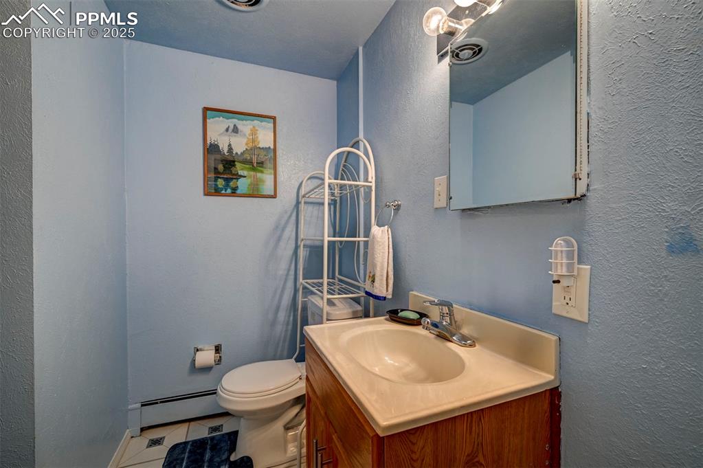 427 Ute Avenue Simla, CO 80835 - Photo 36 of 49 a bathroom with a sink and a toilet