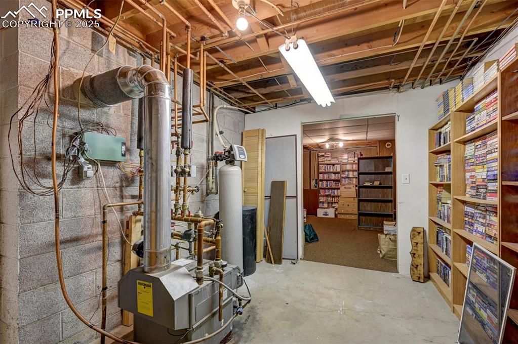 427 Ute Avenue Simla, CO 80835 - Photo 37 of 49 a view of an empty room with furniture and storage