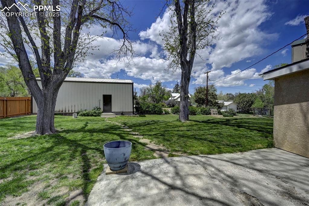 427 Ute Avenue Simla, CO 80835 - Photo 38 of 49 a front view of a house with a yard