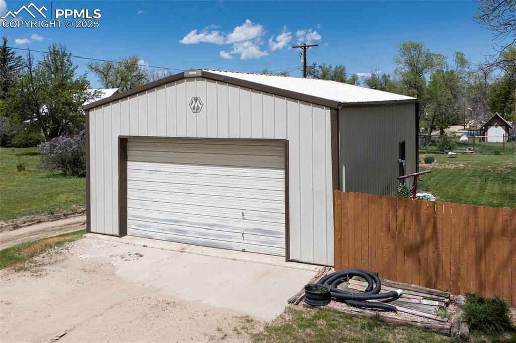 427 Ute Avenue Simla, CO 80835 - Photo 41 of 49 a front view of a house with a yard