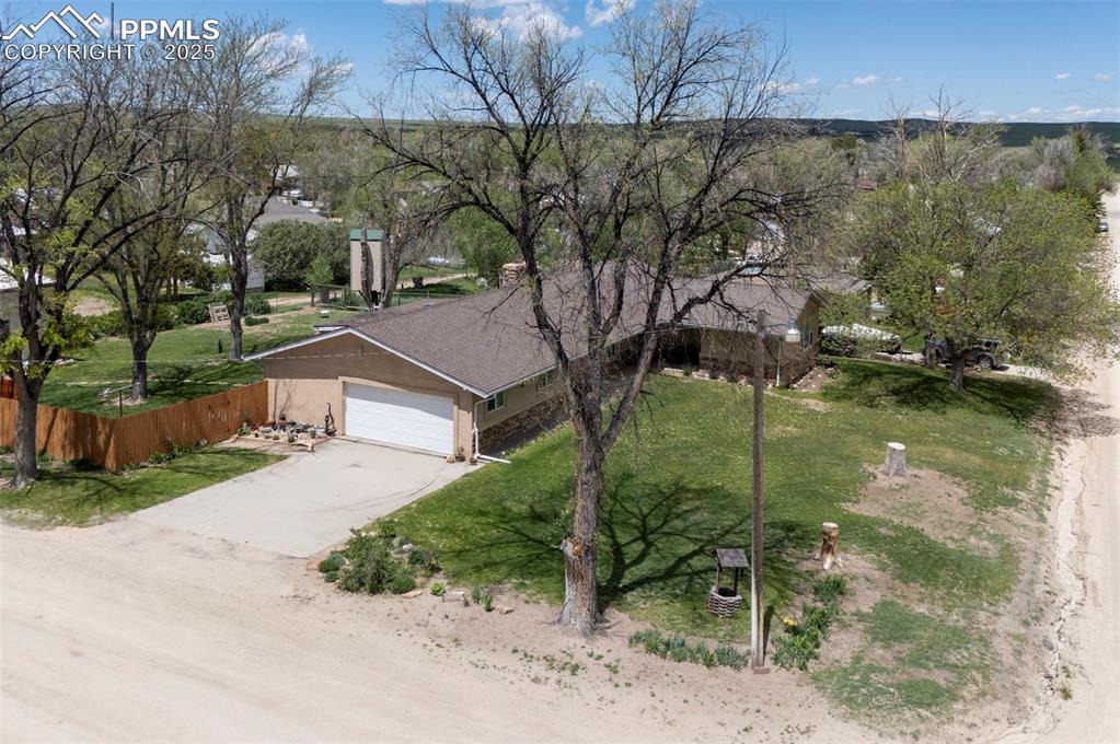 427 Ute Avenue Simla, CO 80835 - Photo 44 of 49 front view of a house with a yard