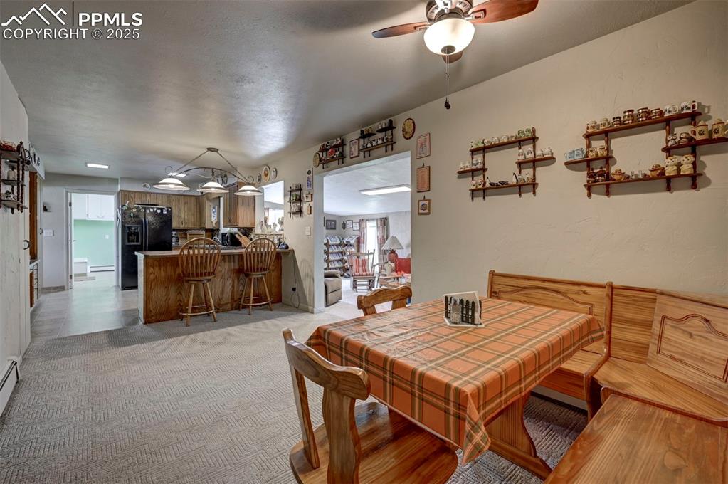 427 Ute Avenue Simla, CO 80835 - Photo 7 of 49 a kitchen with a table and chairs