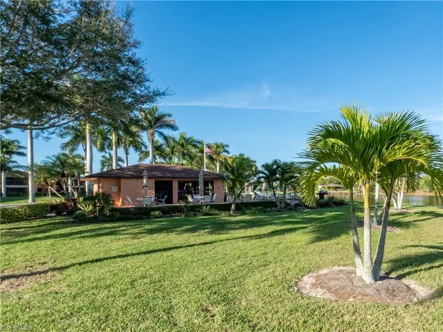 a view of a house with a big yard