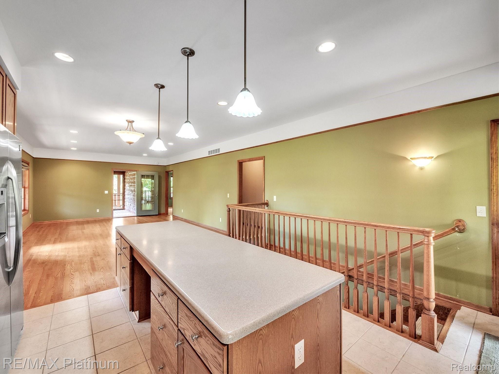 11061 Wiggins Road Howell, MI 48855 - Photo 11 of 79 ISLAND HAS SEATING AREA ON BOTH SIDES