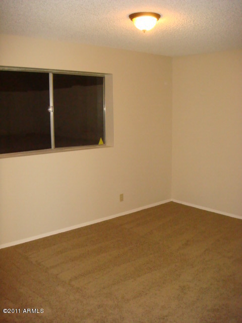 1450 East Fremont Road Phoenix, AZ 85042 - Photo 8 of 9 bedroom1