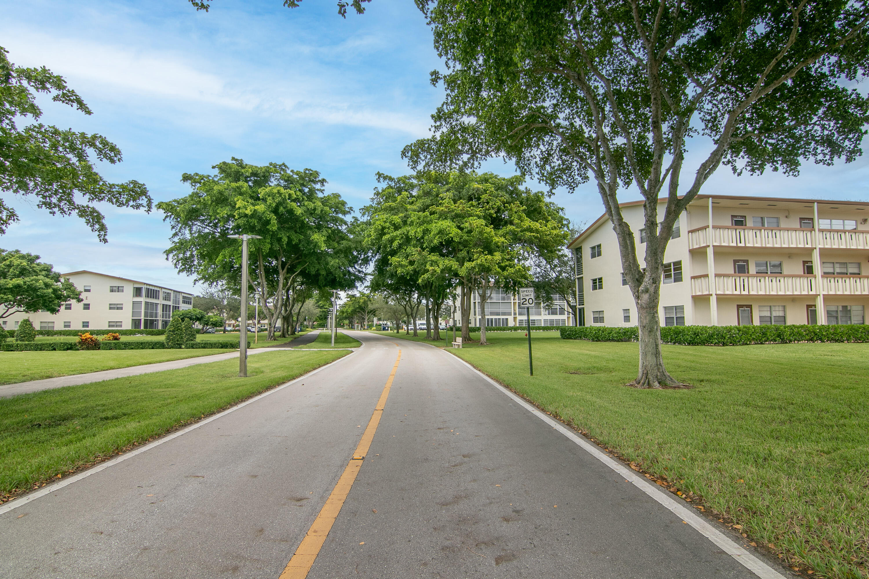 127 Mansfield D Boca Raton, FL 33434 - Photo 24 of 27 a view of a park with a large trees