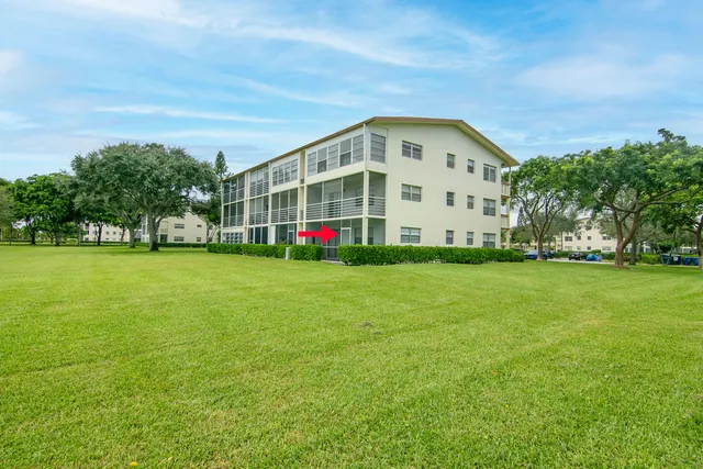 a view of a house with a big yard