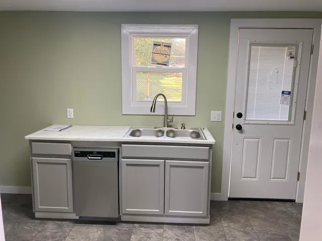a utility room with a sink